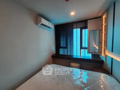 Modern bedroom with air conditioning and stylish window blinds