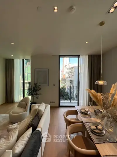 Luxurious modern living room with elegant dining area and stunning city view.