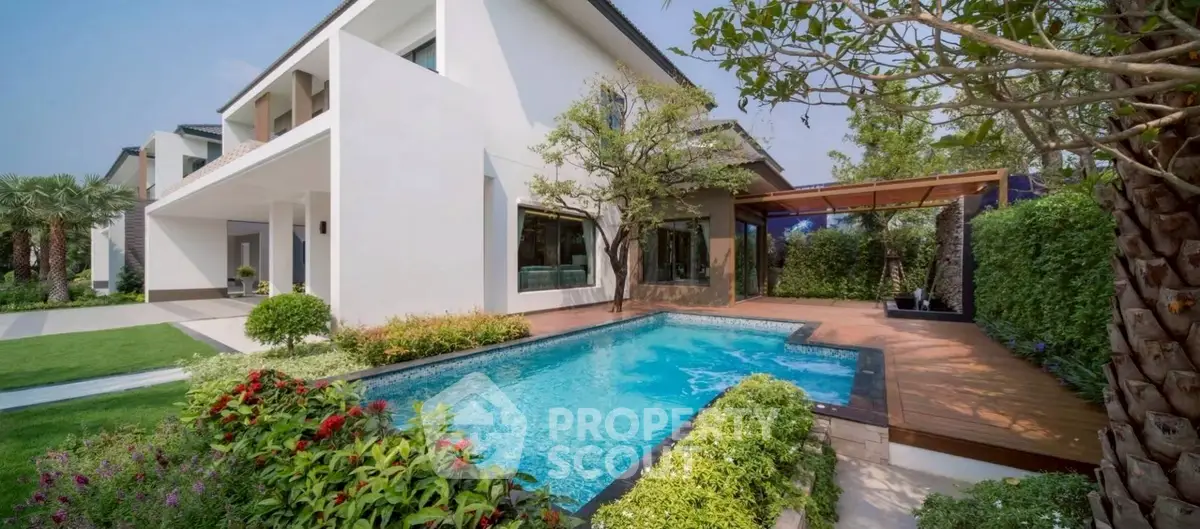 Luxurious modern home with private pool and lush garden