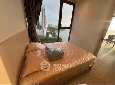 Modern bedroom with stunning city view and natural light