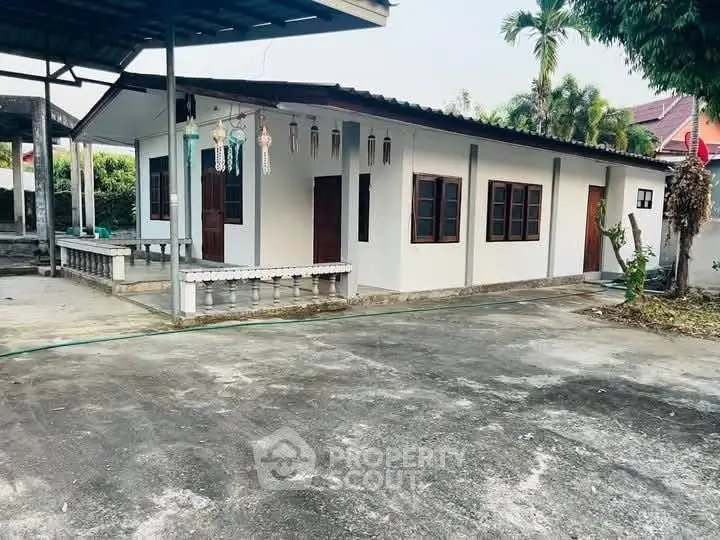 Charming single-story home with spacious outdoor area and covered patio.