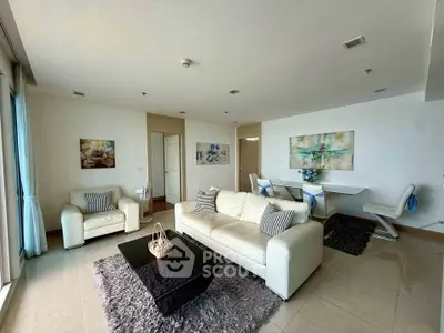 Spacious modern living room with elegant decor and natural light