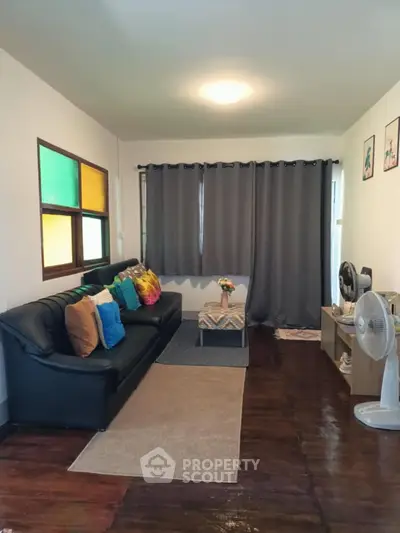 Cozy living room with colorful pillows and modern decor