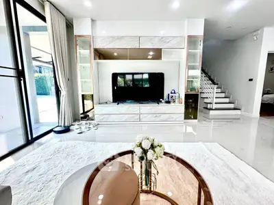 Luxurious modern living room with sleek design and large windows