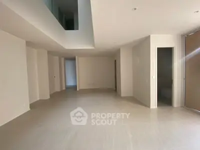 Spacious modern interior with neutral tones and open layout, perfect for customization.