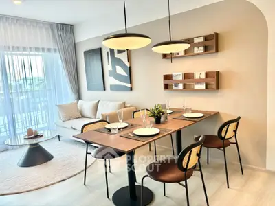 Modern living room with elegant dining area and stylish decor