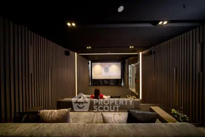 Luxurious home theater with plush seating and ambient lighting
