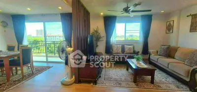 Spacious living room with elegant decor and balcony view in modern apartment