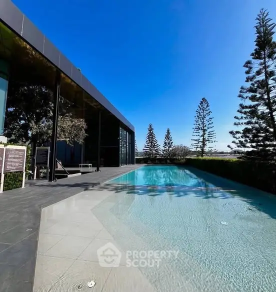 Luxurious outdoor pool area with modern architecture and scenic views, perfect for relaxation and leisure.