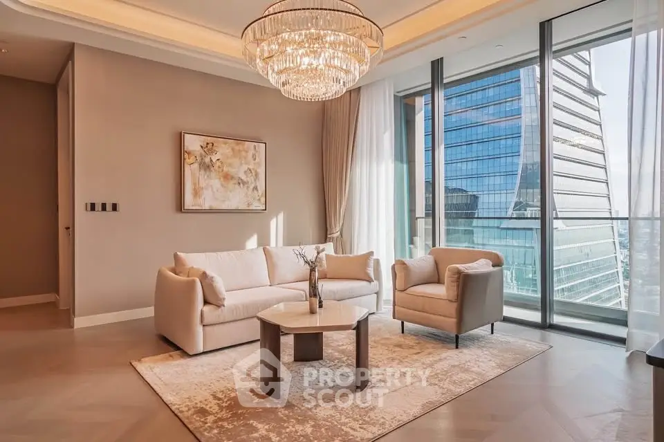 Luxurious living room with elegant chandelier and stunning city view