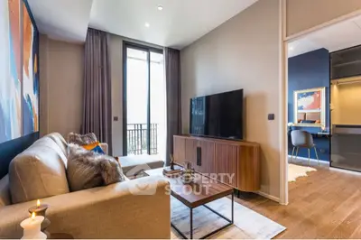 Stylish modern living room with large TV and elegant decor