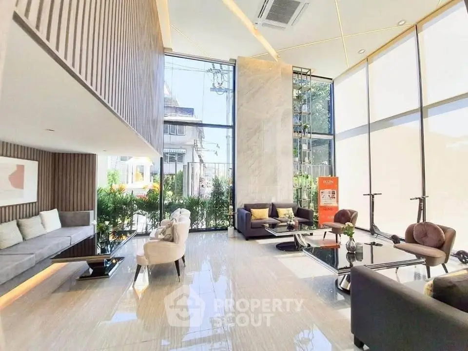 Luxurious modern living room with high ceilings and large windows