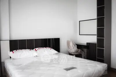 Modern minimalist bedroom with sleek furniture and stylish decor