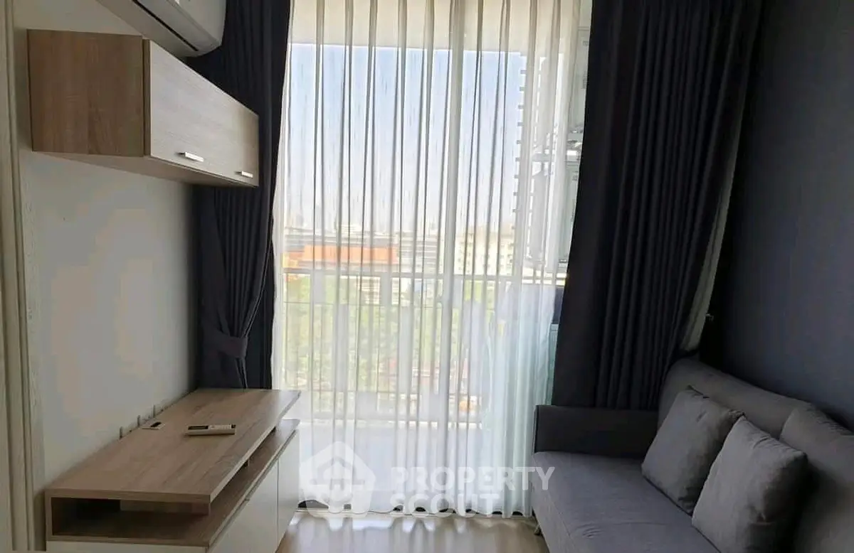 Modern living room with natural light and stylish furniture