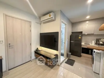 Modern apartment interior with sleek kitchen and cozy living area