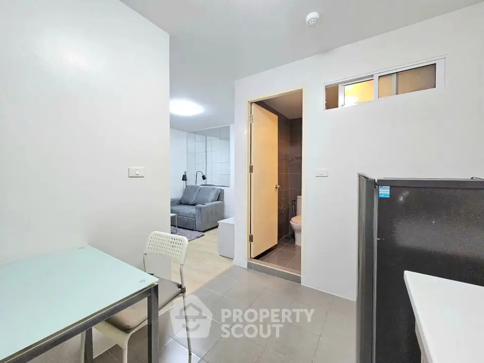 Modern apartment interior with open layout and sleek furnishings