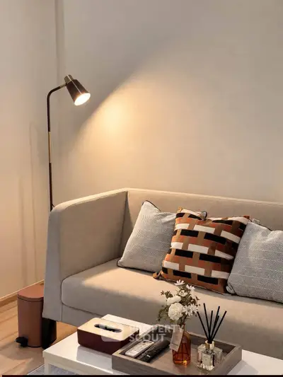 Stylish living room with modern sofa and elegant decor accents