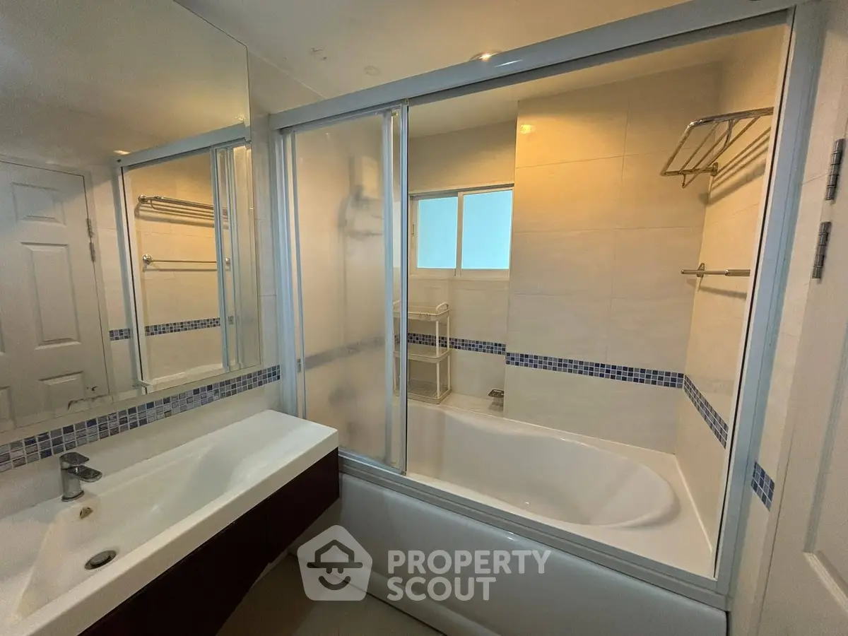 Modern bathroom with sleek design and spacious bathtub