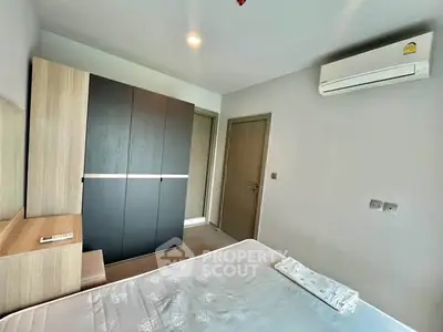 Modern bedroom with air conditioning and sleek wardrobe design
