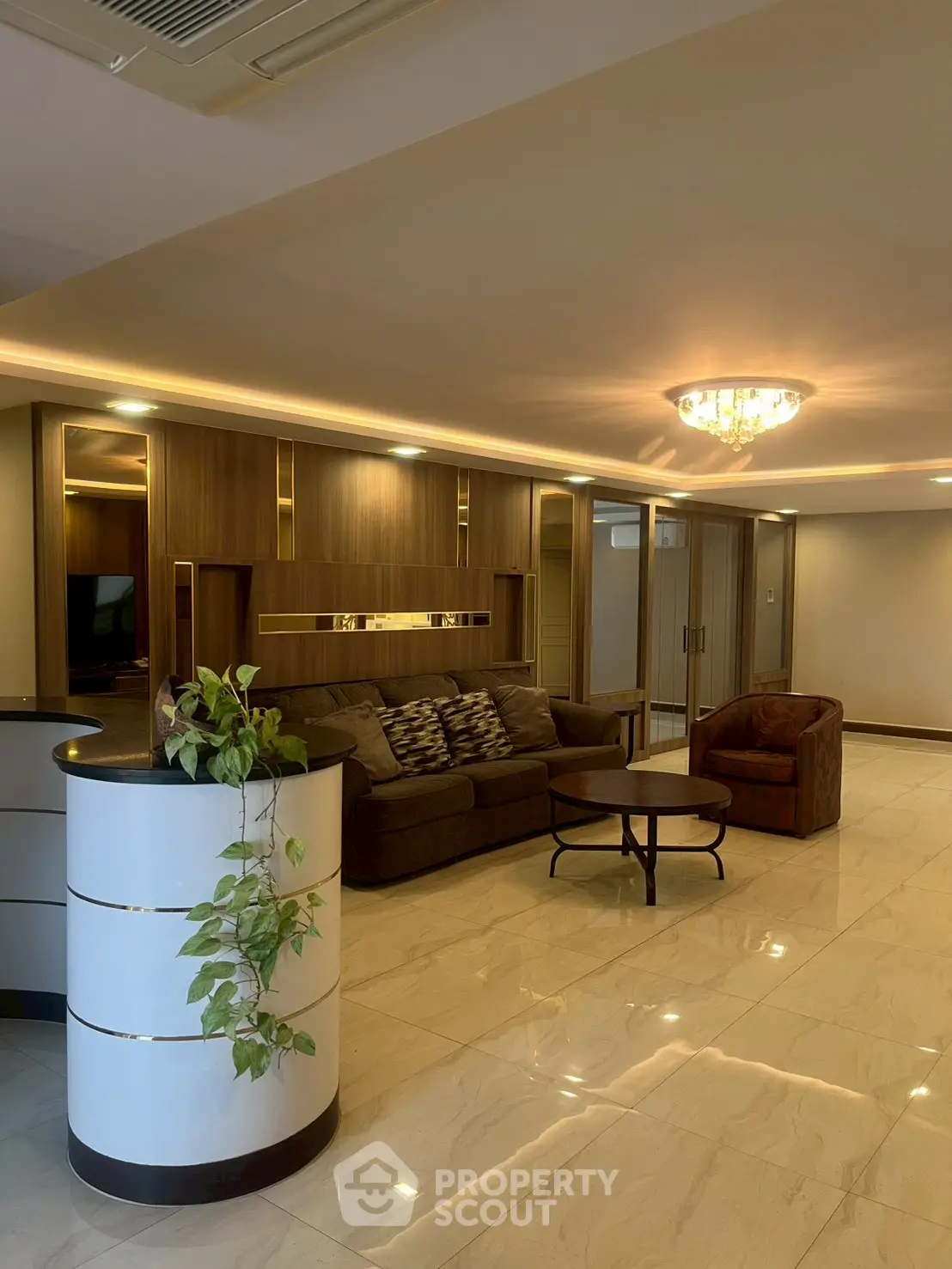Luxurious living room with elegant lighting and modern furniture in a stylish apartment.