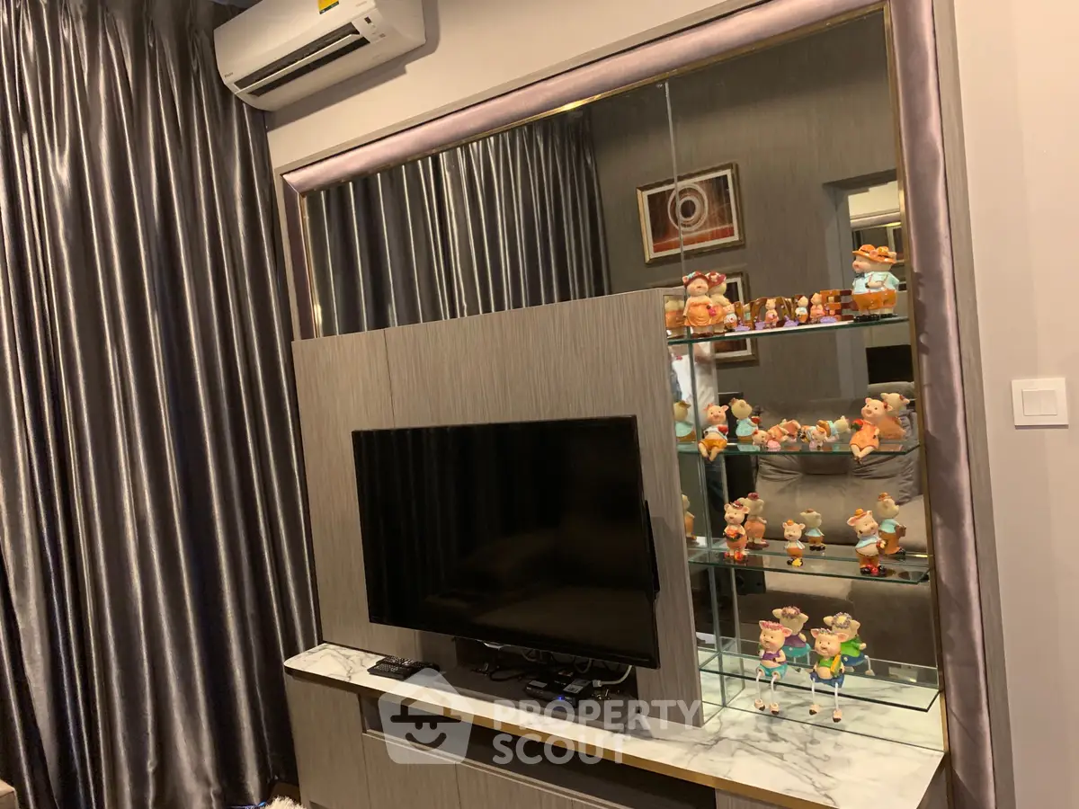 Stylish living room with modern TV setup and elegant decor