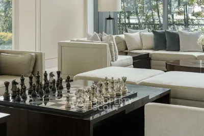 Luxurious living room with elegant chess set and plush seating