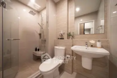 Modern bathroom with sleek design and glass shower enclosure