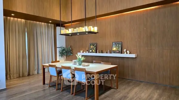 Elegant dining room with modern wooden decor and ambient lighting