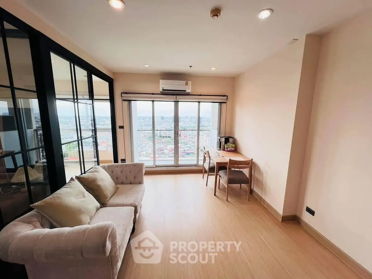 Spacious living room with panoramic city view and elegant furnishings