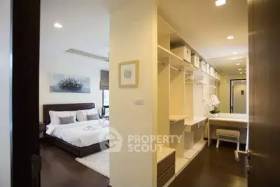 Luxurious bedroom with walk-in closet and elegant decor