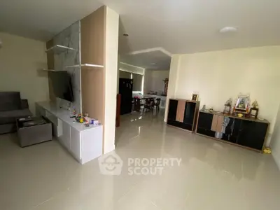 Spacious living room with modern decor and open layout