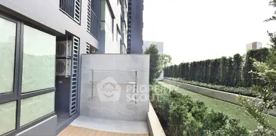 Modern apartment balcony with garden view and sleek design