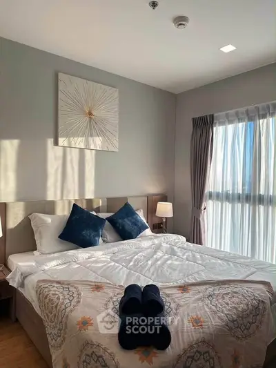 Cozy bedroom with elegant decor and natural light