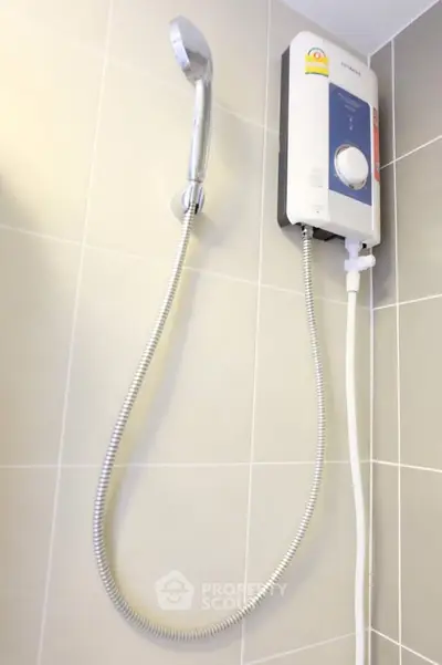 Modern bathroom shower with sleek design and efficient water heater.