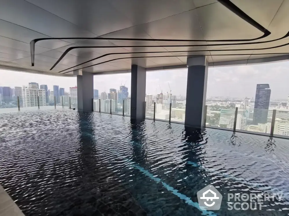 Luxurious rooftop infinity pool with stunning city skyline view