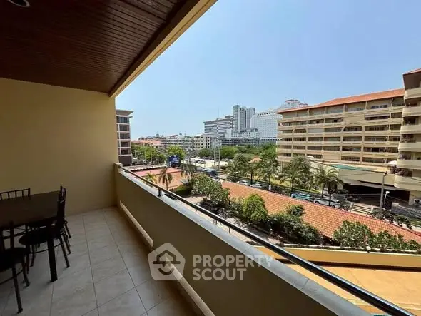 Spacious balcony with city view, perfect for relaxation and enjoying the urban landscape.