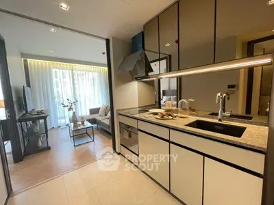 Modern open kitchen with sleek design and spacious living area