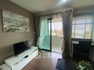 Stylish living room with balcony access and modern decor