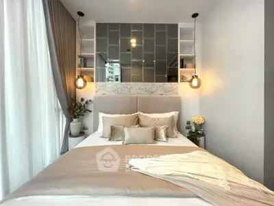 Luxurious bedroom with elegant decor and ambient lighting in modern apartment.