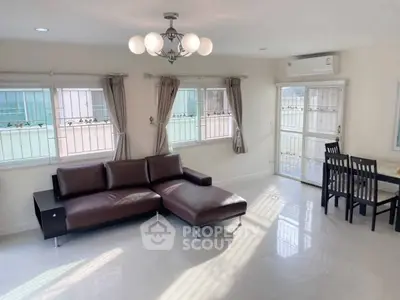 Spacious living room with modern furniture and natural light