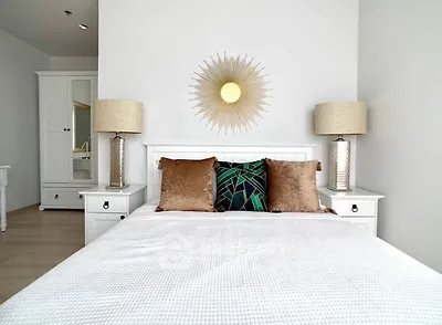 Elegant bedroom with stylish decor and modern furnishings