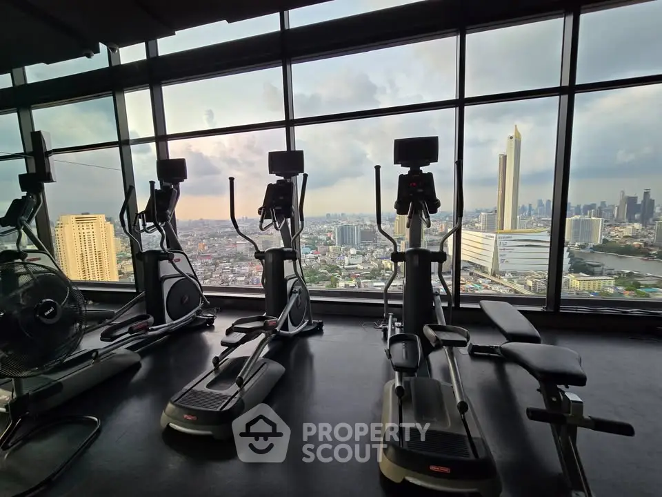 Modern gym with panoramic city view and state-of-the-art equipment