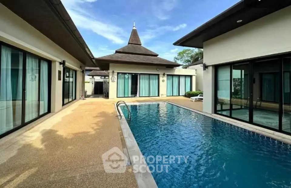 Luxurious villa with private pool and modern architecture, perfect for relaxation and entertainment.