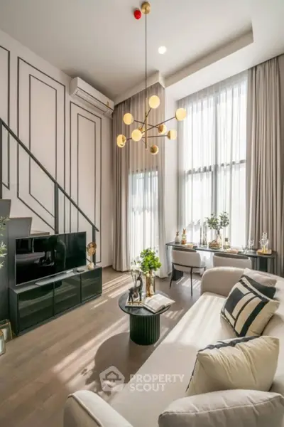 Luxurious modern living room with high ceilings and elegant decor