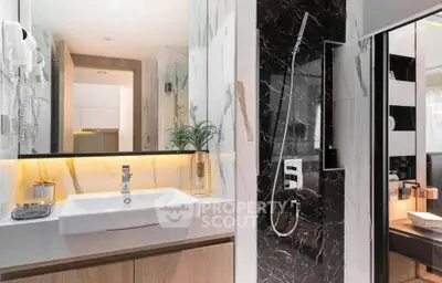 Luxurious modern bathroom with elegant marble accents and sleek fixtures