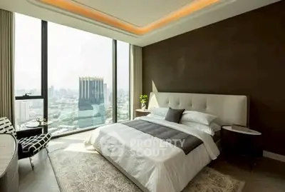 Luxurious bedroom with panoramic city view and elegant decor