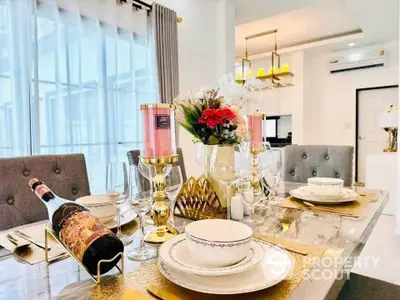 Elegant dining area with luxurious table setting and modern decor