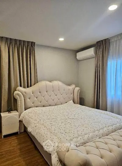 Luxurious bedroom with elegant bed and soft lighting, perfect for relaxation and comfort.