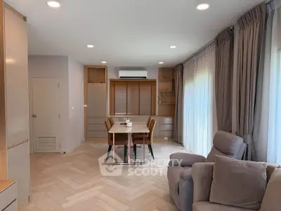 Modern living room with elegant decor and natural light