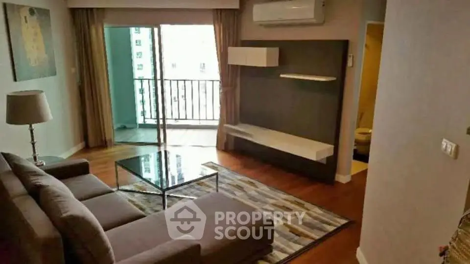 Modern living room with balcony access in a stylish apartment
